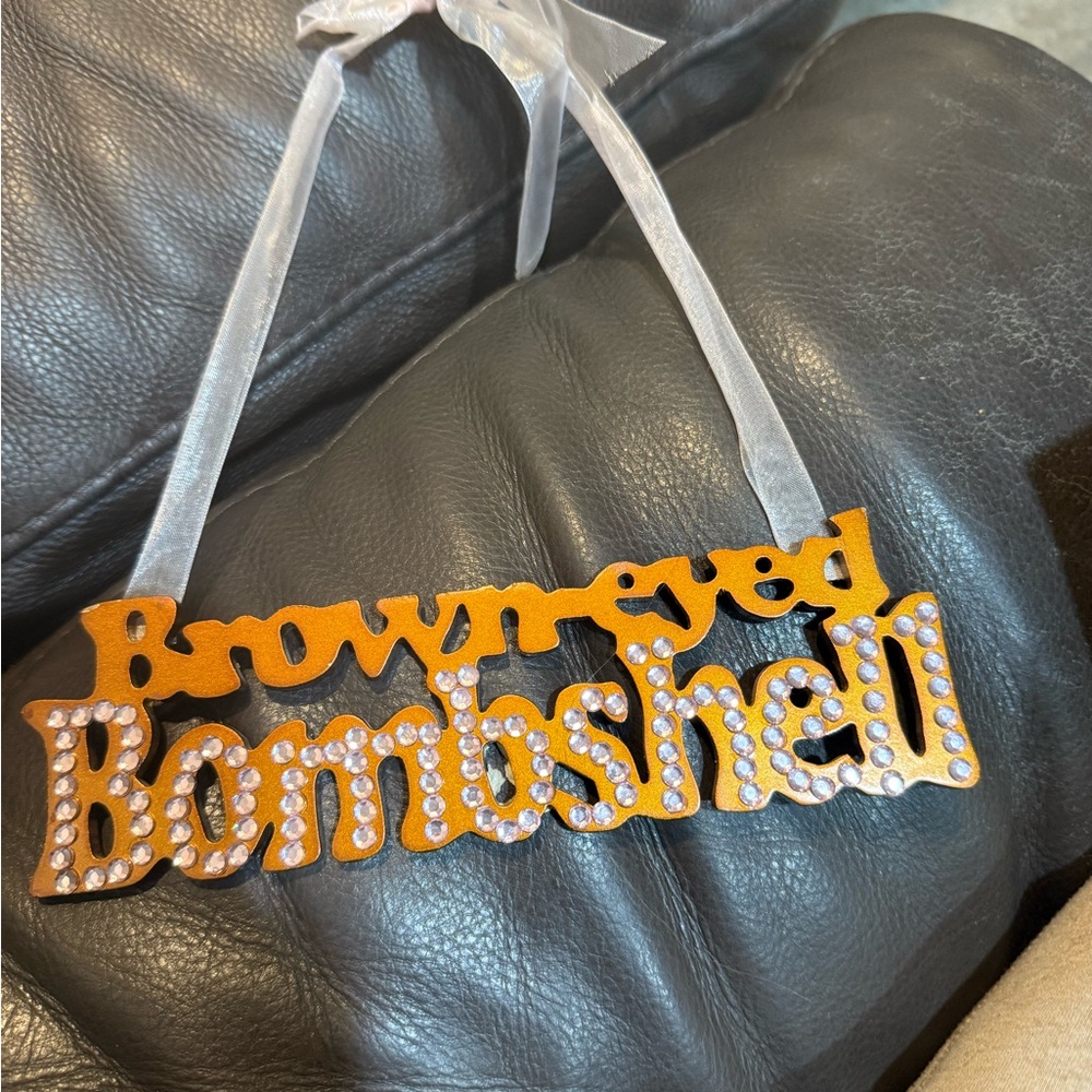Brown Eyed Bombshell Hanging Sign